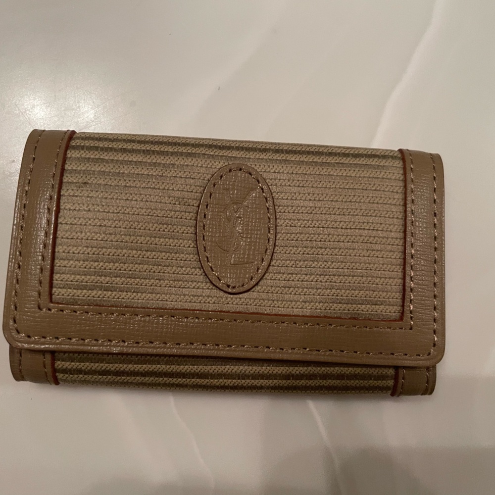 Used Vintage YSL key holder.
